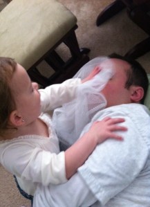 Someone enjoys trying to smother Daddy.